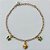 PULSEIRA NO BRUTO PRONTO PARA O BANHO - PULSEIRA COM BORBOLETAS VERDES E CONCHA 17CM / PESO 1,6GR / BRU25522 - Imagem 1