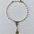 PULSEIRA NO BRUTO PRONTO PARA O BANHO - PULSEIRA COM PÉROLAS E NOSSA SENHORA APARECIDA 17CM / PESO 2,1GR / BRU25524 - Imagem 1