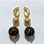 BRINCO FOLHEADO A OURO - BANHADO COM 5 MILÉSIMOS + VERNIZ DIAMOND - BRINCO DE PINO BASE VAZADA E PINGENTE PEDRA SINTÉTICA E ESFERA COM BRILHOS 55MM - OURO1306 - Imagem 1