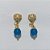 BRINCO FOLHEADO A OURO - BANHADO COM 5 MILÉSIMOS + VERNIZ DIAMOND - BRINCO DE PINO BASE FOLHA E PINGENTE EM ACRÍLICO AZUL 29MM - OURO1317 - Imagem 1