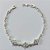 PULSEIRA FOLHEADA A PRATA COM 50 MILÉSIMOS + VERNIZ DIAMOND - PULSEIRA EM ZIRCÔNIAS E TREVOS CRAVEJADO EM ZIRCÔNIAS - TAMANHO: 18CM - PRA1032 - Imagem 1