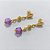 BRINCO FOLHEADO A OURO - BANHADO COM 5 MILÉSIMOS + VERNIZ DIAMOND - BRINCO DE PINO BASE OVAL E ESFERA E PEDRA ACRÍLICA ROXA 9MM - OURO1436 - Imagem 2