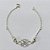 PULSEIRA FOLHEADA A PRATA COM 50 MILÉSIMOS + VERNIZ DIAMOND - PULSEIRA COM FLOR VAZADA - TAM: 19CM - PRA1092 - Imagem 1