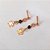 BRINCO NO BRUTO PRONTO PARA O BANHO - BRINCO DE PINO COM ZIRCÔNIA NEGRA E FLOR 20MM - PESO 0,8GR - COMPOSIÇÃO: LATÃO / ZIRCÔNIA - BRU27026 - Imagem 2