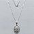 GARGANTILHA FOLHEADA A PRATA COM 50 MILÉSIMOS + VERNIZ DIAMOND - GARGANTILHA COM PINGENTE MEDALHA OVAL SANTA RITA 27MM - PRA1250 - Imagem 1