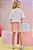 Conjunto de Blusa Boxy Over em Meia Malha e Saia em Tela. Com Shorts Embutido Infanti Infantil Menina - Imagem 2