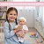 Boneca Vinil Reborn 31cm Infantil Corpo Articulado Com Kit Dormir Completo Manta, Mamadeira, Chupeta E Lenços - Imagem 3