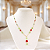 COLAR FEMININO COM PERIDOTO E CRISTAL VERMELHO "VIVACE" - Imagem 2