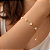 PULSEIRA FEMININA COM MADREPÉROLAS "LUMINÉE" - Imagem 1