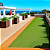 GRAMA SINTETICA PROMO GRASS 12MM BASE LATEX DECORATIVA KAPAZI 2X25M - 50M² - Imagem 2