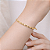 BRACELETE TORCIDO 3MM EM OURO - Imagem 2
