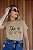 T-SHIRT SHE IS DTF BEGE - Imagem 1