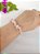 Pulseira Cascalho Quartzo Rosa - Amor próprio e acolhimento - Imagem 2