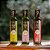 Kit de Azeites Aromatizados Olibi Alho, Pimenta e Limão Siciliano (250ml cada) - Imagem 1