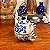 Conjunto de bule e xícara em porcelana. - Imagem 3