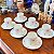 Conjunto com 6 xícaras de café e pires em porcelana Renner. - Imagem 2