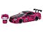 Nissan Skyline GT-R (BNR34) 2002 + Figura Hello Kitty (em metal) Jada Toys 1:24 - Imagem 1