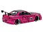 Nissan Skyline GT-R (BNR34) 2002 + Figura Hello Kitty (em metal) Jada Toys 1:24 - Imagem 2