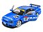 Nissan Skyline GT-R (R34) Street Fighter CALSONIC 2000 1:18 Solido Azul - Imagem 6