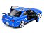 Nissan Skyline GT-R (R34) Street Fighter CALSONIC 2000 1:18 Solido Azul - Imagem 5