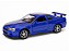 Nissan Skyline GT-R (R34) 1:24 Welly Azul - Imagem 1