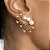BRINCO EAR CUFF COM TRÊS PÉROLAS SHELL BANHADO A OURO - Imagem 2