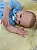 Bebê reborn menino com 57 cm e 2,4 kg aproximadamente, cabelos pintados castanhos, olhos castanhos - Imagem 3