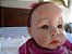 Bebê reborn Lara cabelos castanho e olhos verdes - Imagem 9