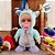 Boneca Baby Pelúcia Azul e Roxo Com Som e Movimento - 28cm - 1 unidade - Rizzo - Imagem 3