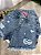 Short Saia Jeans Rebeca Com Detalhes Rasgadinhos - Imagem 9