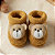 Sapatinho de Tricô com Aplicação 3D de Urso - Imagem 9