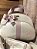 Kit Bolsa média, Mochilinha baby P, Necessarie Carol e Porta carteira de vacinação no Sintético Pérola com faixa Rose - Imagem 3