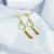 Brincos em ouro amarelo com green gold - Imagem 1