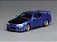 *** PRÉ-VENDA *** Nissan Skyline GT-R (R34) V-Spec II Customized 1:64 MOTORHELIX - Imagem 1