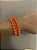 Pulseiras laranja - Imagem 1