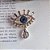 Broche Olho Gota Prateado - Imagem 1