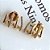 Brinco Quatro Garras Dourado - Imagem 1