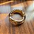 Bracelete Wave Dourado: Luxo e Movimento em uma Joia Escultural - Imagem 2