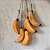 Penca Decorativa Artesanal com 5 Bananas em Madeira - Imagem 3