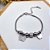 PULSEIRA AÇO INOX TIPO PANDORA PINGENTES AÇO INOX BORBOLETA STRASS - PRATEADA - Imagem 2
