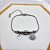 PULSEIRA COM BERLOQUES AÇO INOX  BORBOLETA CRAVEJADA STRASS - PRATEADA - Imagem 2