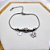 PULSEIRA COM BERLOQUES AÇO INOX  BORBOLETA CRAVEJADA STRASS - PRATEADA - Imagem 3