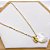 COLAR AÇO INOXIDÁVEL 45CM  CONCHA PEROLADA DOURADO - BÚZIOS - Imagem 1