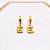BRINCO ARGOLINHA CLICK AÇO INOXIDÁVEL LETRAS - DOURADO Modelo:E - Imagem 1