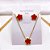 CONJUNTO COLAR  E BRINCO AÇO INOXIDÁVEL  FLOR VERMELHO - DOURADO - Imagem 1