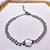 PULSEIRA AÇO INOXIDÁVEL FOLHAS FLOR PEROLADA - PRATEADA - Imagem 2
