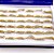 CAIXA ANEL AÇO INOXIDÁVEL SOLITARIO 4MM PEDRA CRISTAL - DOURADO (36 UNIDADES) - Imagem 1