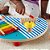 Fisher price wood mesa musical c/instrument 3em1 - mattel (unidade) - Imagem 5