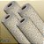TNT Estampado Arabesco BRANCO/OURO 1,40M 40G Rolo 25M - Imagem 3