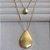 Colar Corrente Duplo com Pingentes de Gota Lisa Dourado - Imagem 2